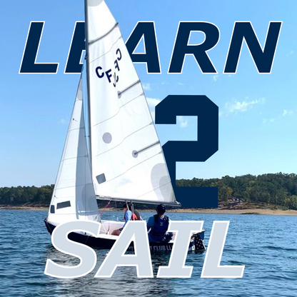 Sailing lessons near you with students learning to sail on a small sailboat during a beginner sailing class