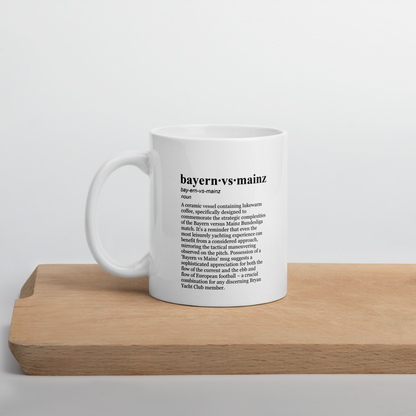 Light gray ceramic coffee mugs, a perfect Bundesliga morning brew.