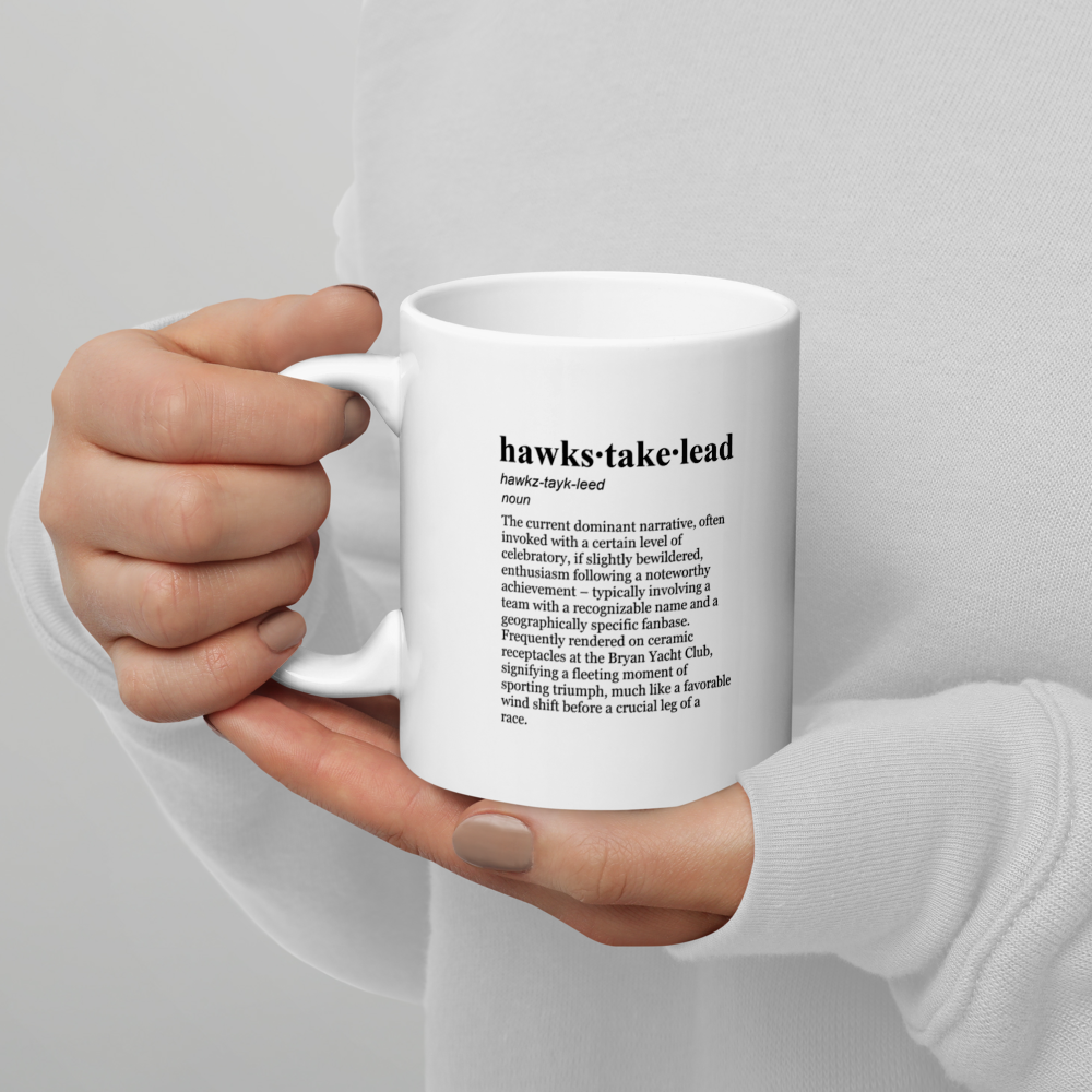 Glossy white ceramic coffee mugs, a celebration for the 76ers and Rams fans.